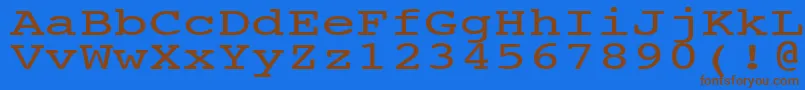 フォントNtcouriervkNormal140n – 茶色の文字が青い背景にあります。