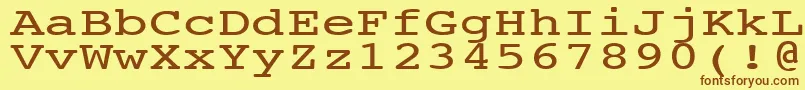 フォントNtcouriervkNormal140n – 茶色の文字が黄色の背景にあります。