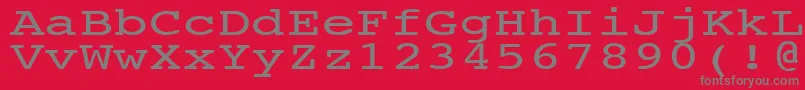NtcouriervkNormal140n-fontti – harmaat kirjasimet punaisella taustalla
