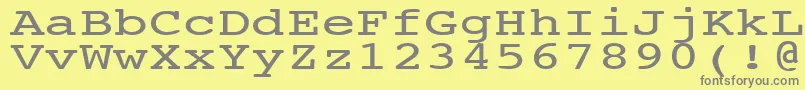 フォントNtcouriervkNormal140n – 黄色の背景に灰色の文字