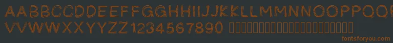 Pwficelles-fontti – ruskeat fontit mustalla taustalla