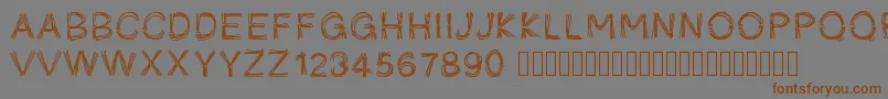 Pwficelles-fontti – ruskeat fontit harmaalla taustalla