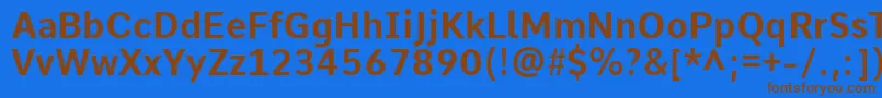 フォントCommeBold – 茶色の文字が青い背景にあります。