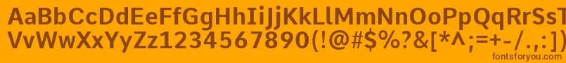 Czcionka CommeBold – brązowe czcionki na pomarańczowym tle