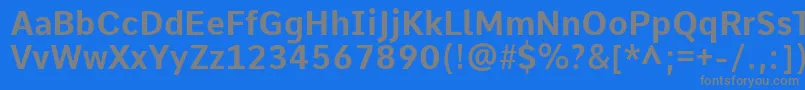 フォントCommeBold – 青い背景に灰色の文字