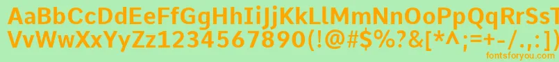 CommeBold-Schriftart – Orangefarbene Schriften auf grünem Hintergrund