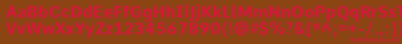 フォントCommeBold – 赤い文字が茶色の背景にあります。
