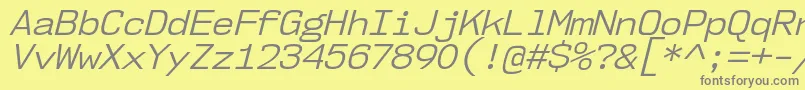 fuente Nk57MonospaceNoBkIt – Fuentes Grises Sobre Fondo Amarillo