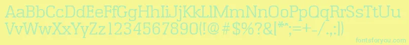 EnschedeLight-Schriftart – Grüne Schriften auf gelbem Hintergrund