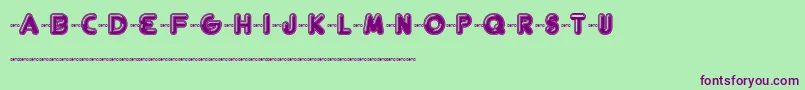 Fthelsin Font – Purple Fonts on Green Background