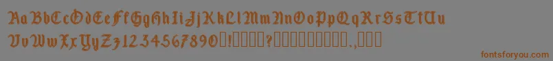 フォントFairland – 茶色の文字が灰色の背景にあります。