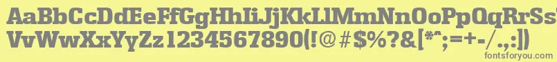 フォントEnschedeExtrabold – 黄色の背景に灰色の文字