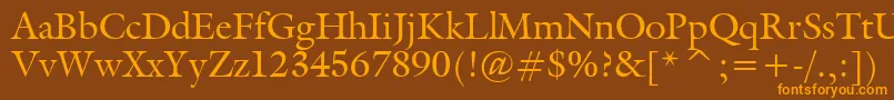 フォントGalliardBt – オレンジ色の文字が茶色の背景にあります。