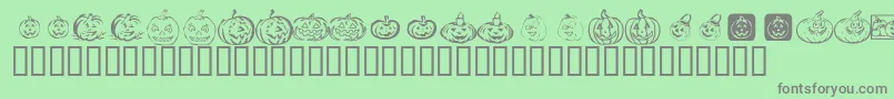 フォントKrPickAPumpkin – 緑の背景に灰色の文字