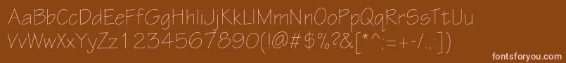 Шрифт Eskiztwolightc – розовые шрифты на коричневом фоне