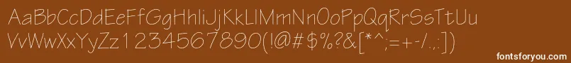 Шрифт Eskiztwolightc – белые шрифты на коричневом фоне