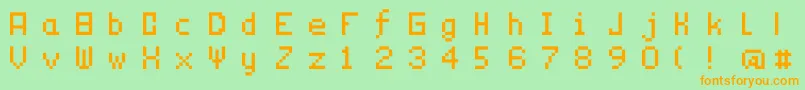 フォントTechnicality – オレンジの文字が緑の背景にあります。