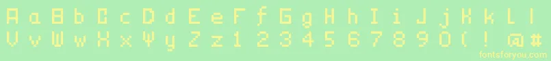 フォントTechnicality – 黄色の文字が緑の背景にあります