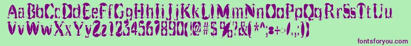 Getburnt Font – Purple Fonts on Green Background