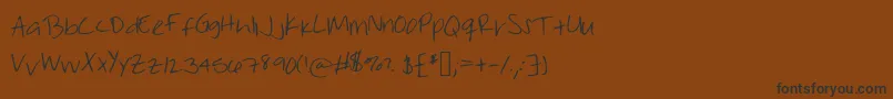 フォントWorkthatwednesday – 黒い文字が茶色の背景にあります