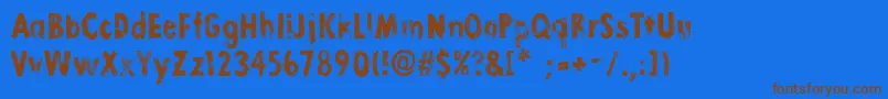 LinoStamp Font – Brown Fonts on Blue Background