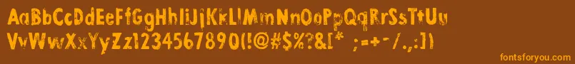 LinoStamp Font – Orange Fonts on Brown Background