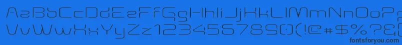 Aunchanted Thin Expanded-Schriftart – Schwarze Schriften auf blauem Hintergrund