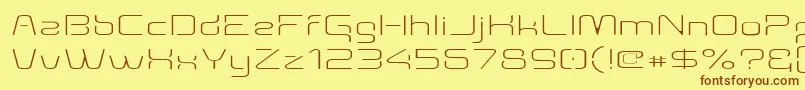 Aunchanted Thin Expanded Font – Brown Fonts on Yellow Background