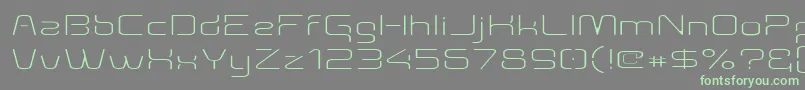 Aunchanted Thin Expanded-Schriftart – Grüne Schriften auf grauem Hintergrund