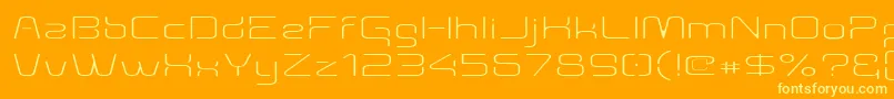 Aunchanted Thin Expanded-Schriftart – Gelbe Schriften auf orangefarbenem Hintergrund