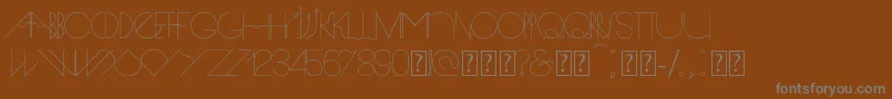 Spike-Schriftart – Graue Schriften auf braunem Hintergrund