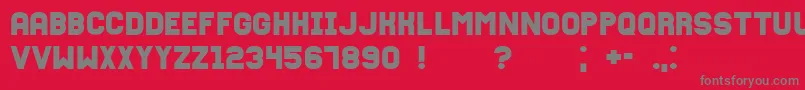 Fixation-fontti – harmaat kirjasimet punaisella taustalla
