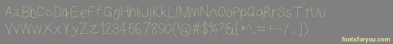 Kabinabook Font – Yellow Fonts on Gray Background