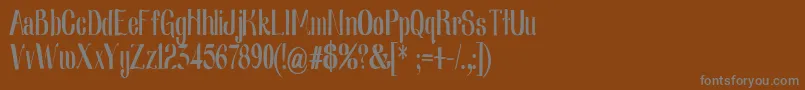Nearlydigcon-fontti – harmaat kirjasimet ruskealla taustalla