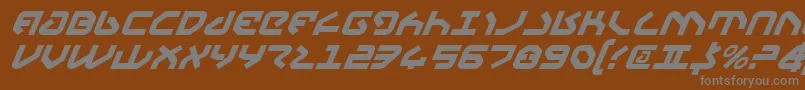 YahrenItalic-fontti – harmaat kirjasimet ruskealla taustalla