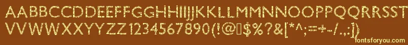 Pwsavane-fontti – keltaiset fontit ruskealla taustalla