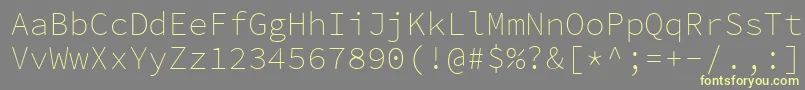 Fonte SourcecodeproExtralight – fontes amarelas em um fundo cinza