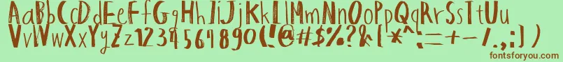 HapoleMarker-Schriftart – Braune Schriften auf grünem Hintergrund