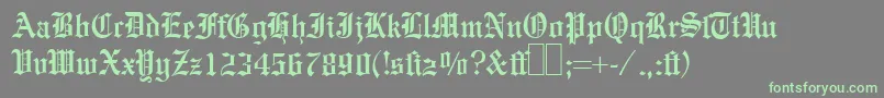 E780BlackletterRegular-Schriftart – Grüne Schriften auf grauem Hintergrund
