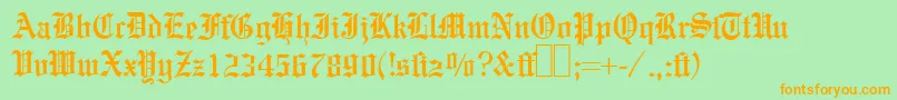 E780BlackletterRegular Font – Orange Fonts on Green Background