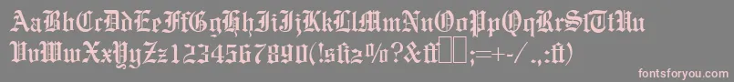 フォントE780BlackletterRegular – 灰色の背景にピンクのフォント