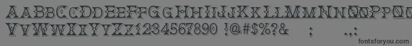 DeborahFancyDress Font – Black Fonts on Gray Background