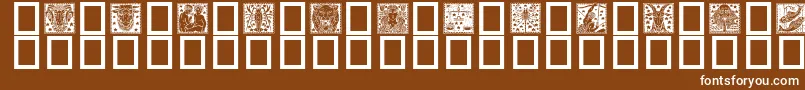 Zodiac02-fontti – valkoiset fontit ruskealla taustalla