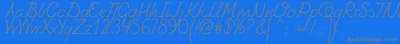 フォントFely – 青い背景に灰色の文字