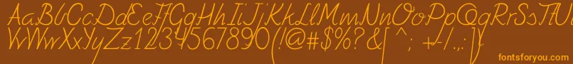 Fely-Schriftart – Orangefarbene Schriften auf braunem Hintergrund