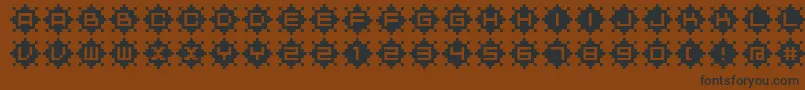 フォントBmRubyA12 – 黒い文字が茶色の背景にあります