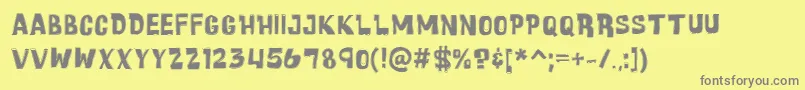 CartoonicMassiveCollage Font – Gray Fonts on Yellow Background