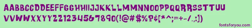 CartoonicMassiveCollage Font – Purple Fonts on Green Background