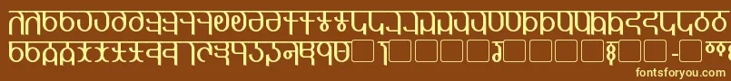 Qijomi-fontti – keltaiset fontit ruskealla taustalla
