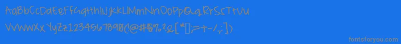 Czcionka Peameaghan – szare czcionki na niebieskim tle